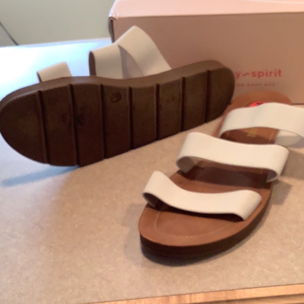 White strappy cushioned slide shoes